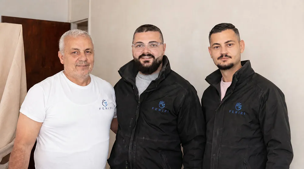 Bujar Ferizi, Ideal Ferizi and their father — the Ferizi family property services team in company uniforms, London